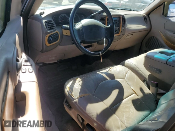 1999 Ford F-150 with VIN 1FTRX17W0XNA48744, listed as a Copart auction lot 49479635 with Not Provided miles and Salvage Title. Bid and sale history available at DreamBid. Image 8.