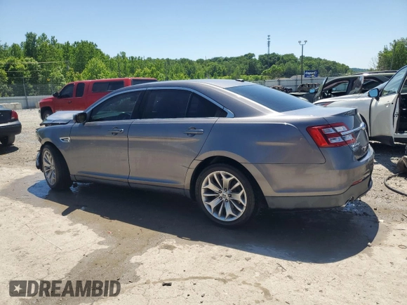 2013 Ford Taurus Limited with VIN 1FAHP2F85DG225363, listed as a Copart auction lot 56127255 with 128,660 mi miles and Salvage title. Bid and sale history available at DreamBid. Image 2.