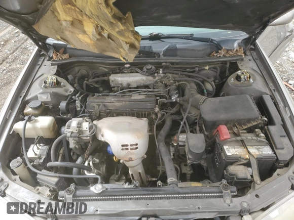 2000 Toyota Camry CE with VIN JT2BG22K6Y0471945, listed as a Copart auction lot 48932715 with Not Provided miles and Salvage Title. Bid and sale history available at DreamBid. Image 12.