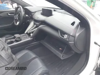 2023 Acura TLX w/A-Spec Package z VIN 19UUB6F52PA002372, wystawiony jako IAAI lot #41968231 z przebiegiem 15 110 mil mil oraz . Historia ofert i sprzedaży dostępna na DreamBid. Obrazek 5.