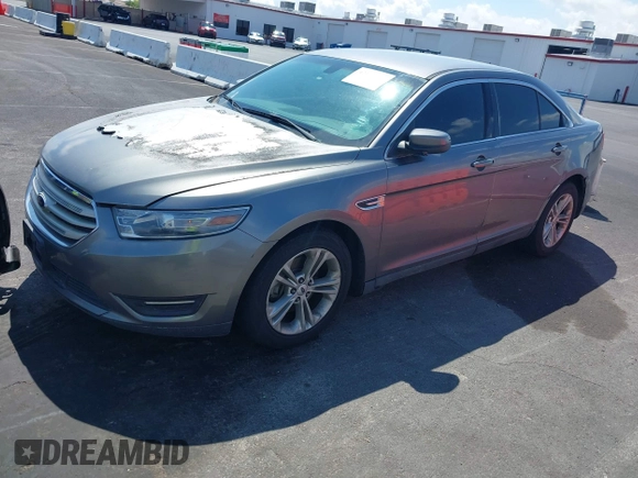 2013 Ford Taurus SEL with VIN 1FAHP2E89DG207904, listed as a IAAI auction lot 42184669 with 147,321 mi miles and . Bid and sale history available at carsss.com. Image 2.