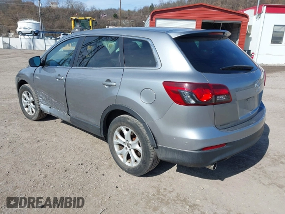 2015 Mazda CX-9 Sport with VIN JM3TB2BA6F0455539, listed as a IAAI auction lot 41839466 with 143,667 mi miles and . Bid and sale history available at carsss.com. Image 3.