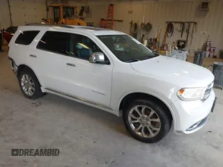 2016 Dodge Durango Citadel z VIN 1C4RDJEG9GC371805, wystawiony jako IAAI lot #42135988 z przebiegiem 122 924 mil mil oraz . Historia ofert i sprzedaży dostępna na DreamBid. Obrazek 1.