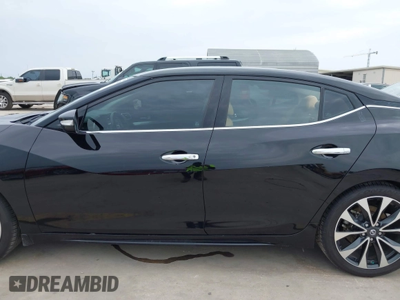 2016 Nissan Maxima SV z VIN 1N4AA6AP2GC376472, wystawiony jako IAAI lot #42115734 z przebiegiem 98 432 mil mil oraz . Historia ofert i sprzedaży dostępna na DreamBid. Obrazek 14.
