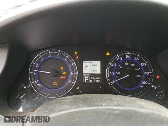 2012 Infiniti EX Journey with VIN JN1AJ0HR1CM450261, listed as a Copart auction lot 72617674 with 137,040 mi miles and Salvage Title. Bid and sale history available at DreamBid. Image 9.