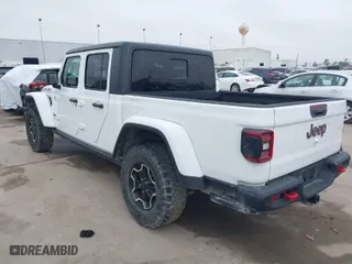 2020 Jeep Gladiator Rubicon with VIN 1C6JJTBG9LL171398, listed as a IAAI auction lot 41390927 with 42,812 mi miles. Bid and sale history available at carsss.com. Image 3.