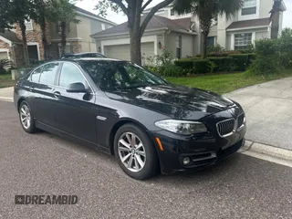2016 BMW 5 Series 528i xDrive with VIN WBA5A7C52GG149284, listed as a Copart auction lot 61264815 with 104,932 mi miles and Clean title. Bid and sale history available at DreamBid. Image 1.