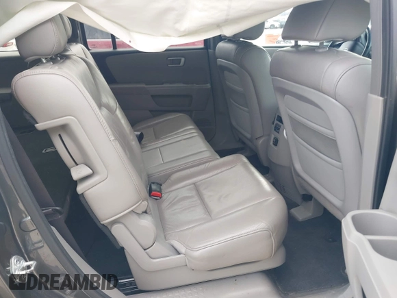 2011 Honda Pilot EX-L with VIN 5FNYF4H59BB042308, listed as a IAAI auction lot 41635511 with 196,736 mi miles and . Bid and sale history available at carsss.com. Image 8.