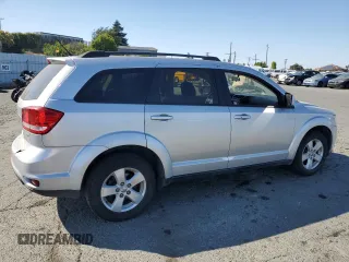 2012 Dodge Journey SXT z VIN 3C4PDDBG0CT293331, wystawiony jako Copart lot #62602995 z przebiegiem 185 605 mil mil oraz Szkoda całkowita • Salvage title. Historia ofert i sprzedaży dostępna na DreamBid. Obrazek 3.