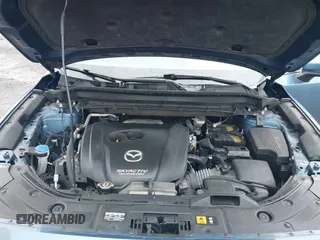 2019 Mazda CX-5 Sport with VIN JM3KFBBM5K0668678, listed as a IAAI auction lot 41811146 with 102,634 mi miles and . Bid and sale history available at DreamBid. Image 10.