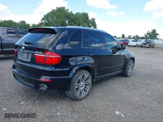 2011 BMW X5 35i with VIN 5UXZV4C53BL743050, listed as a IAAI auction lot 40074369 with 118,970 mi miles. Bid and sale history available at carsss.com. Image 4.