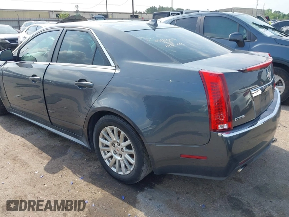 2011 Cadillac CTS Luxury with VIN 1G6DF5EYXB0151106, listed as a IAAI auction lot 42107070 with 140,468 mi miles and . Bid and sale history available at DreamBid. Image 3.