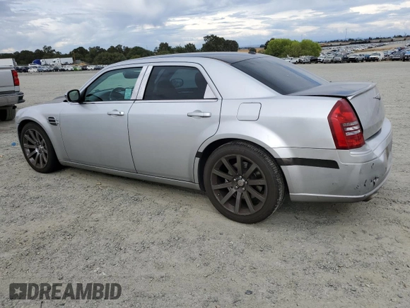2007 Chrysler 300 C SRT8 with VIN 2C3LA73W07H660214, listed as a Copart auction lot 70283834 with 249,130 mi miles and Salvage Title. Bid and sale history available at carsss.com. Image 2.