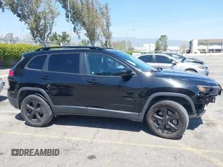 2020 Jeep Cherokee Latitude Plus with VIN 1C4PJMLB8LD563861, listed as a IAAI auction lot 41973359 with 62,234 mi miles and . Bid and sale history available at DreamBid. Image 14.