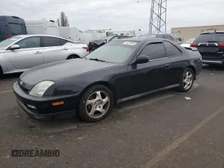 1998 Honda Prelude with VIN JHMBB6148WC001586, listed as a Copart auction lot 43279055 with 124,508 mi miles and Salvage Title. Bid and sale history available at DreamBid. Image 1.