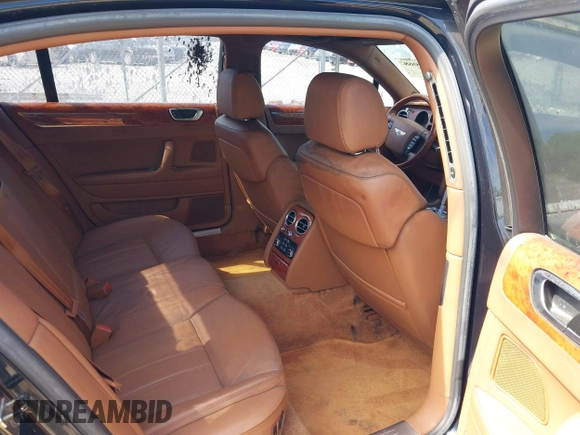 2006 Bentley Flying Spur z VIN SCBBR53W06C039791, wystawiony jako IAAI lot #42295068 z przebiegiem 48 739 mil mil oraz . Historia ofert i sprzedaży dostępna na DreamBid. Obrazek 8.