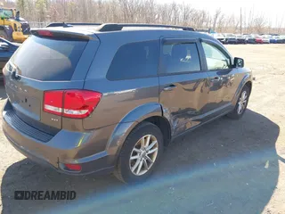 2014 Dodge Journey SXT with VIN 3C4PDCBB2ET156215, listed as a IAAI auction lot 41765840 with 129,737 mi miles and . Bid and sale history available at DreamBid. Image 4.