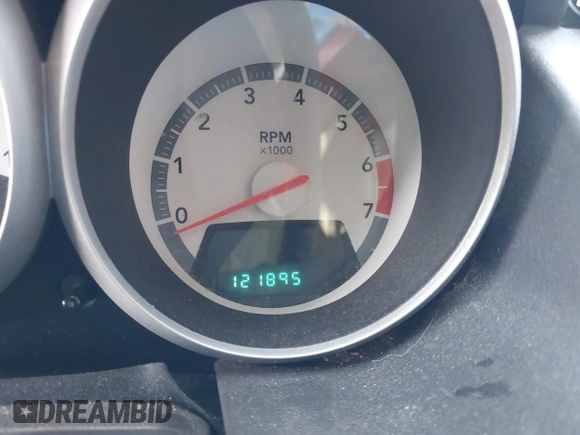 2009 Dodge Grand Caravan SE with VIN 2D8HN44E79R673244, listed as a IAAI auction lot 41913383 with 121,895 mi miles and . Bid and sale history available at DreamBid. Image 7.