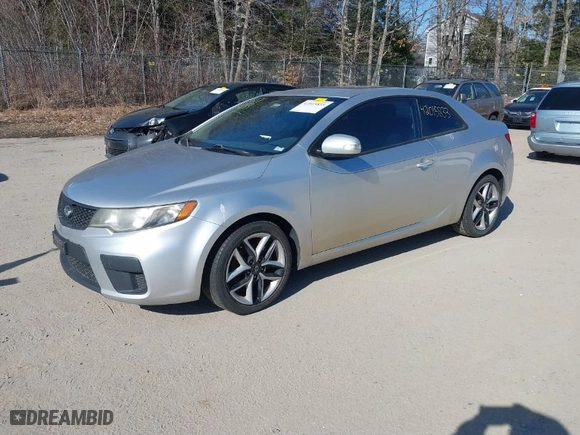 2010 Kia Forte Koup EX with VIN KNAFU6A29A5132726, listed as a IAAI auction lot 42015833 with 156,000 mi miles. Bid and sale history available at carsss.com. Image 2.