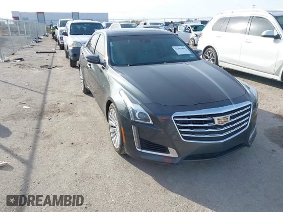 2017 Cadillac CTS Sedan Luxury RWD with VIN 1G6AR5SX3H0127499, listed as a IAAI auction lot 41093864 with 77,464 mi miles. Bid and sale history available at carsss.com. Image 1.