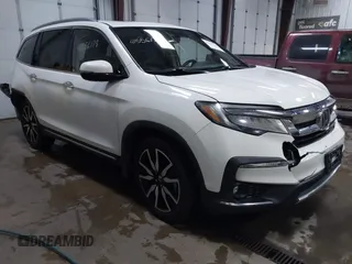 2019 Honda Pilot Touring 7-Passenger with VIN 5FNYF5H63KB038284, listed as a IAAI auction lot 41556178 with 178,520 mi miles and . Bid and sale history available at DreamBid. Image 1.