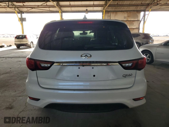 2019 Infiniti QX60 LUXE with VIN 5N1DL0MN2KC503153, listed as a Copart auction lot 69657904 with 79,759 mi miles and Salvage Title. Bid and sale history available at carsss.com. Image 6.