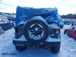 2020 Jeep Wrangler Unlimited Rubicon with VIN 1C4HJXFN5LW176104, listed as a IAAI auction lot 41332511 with 70,428 mi miles. Bid and sale history available at carsss.com. Image 17.