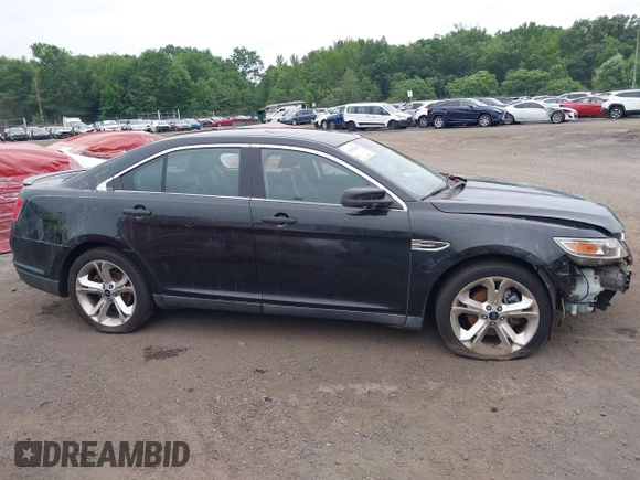 2010 Ford Taurus SHO with VIN 1FAHP2KT7AG132561, listed as a IAAI auction lot 31602484 with 118,333 mi miles and . Bid and sale history available at DreamBid. Image 14.