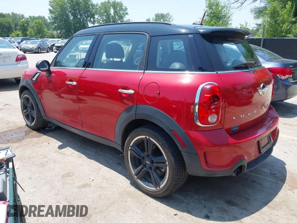 2013 MINI Countryman S with VIN WMWZC3C58DWP24865, listed as a IAAI auction lot 42386463 with 100,612 mi miles and . Bid and sale history available at DreamBid. Image 3.