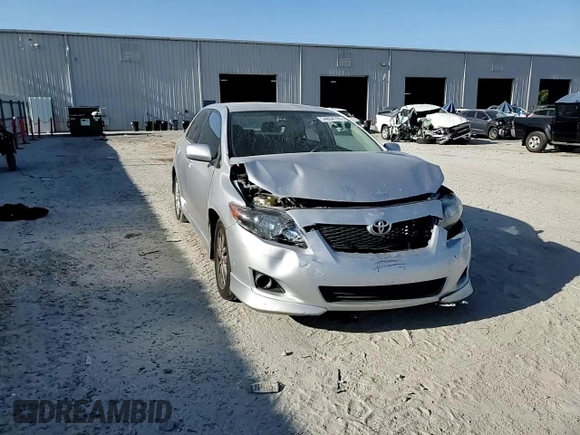 2010 Toyota Corolla z VIN 1NXBU4EE2AZ281538, wystawiony jako Copart lot #54864765 z przebiegiem 157 326 mil mil oraz Szkoda całkowita • Salvage title. Historia ofert i sprzedaży dostępna na DreamBid. Obrazek 13.