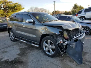 2011 Jeep Grand Cherokee Overland with VIN 1J4RS6GGXBC601757, listed as a Copart auction lot 82770454 with 132,109 mi miles and Salvage Title. Bid and sale history available at DreamBid. Image 4.