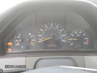 2000 Mercedes-Benz E-Class with VIN WDBJF70J1YB078418, listed as a Copart auction lot 71177244 with 189,838 mi miles and Salvage Title. Bid and sale history available at carsss.com. Image 9.