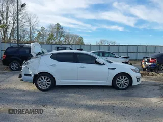 2015 Kia Optima EX with VIN 5XXGN4A77FG437245, listed as a IAAI auction lot 41560539 with 196,480 mi miles and . Bid and sale history available at DreamBid. Image 14.