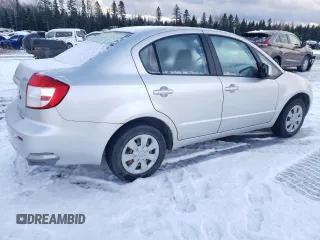 2010 Suzuki SX4 LE with VIN JS2YC5A25A6300970, listed as a Copart auction lot 81596084 with 142,083 mi miles and Salvage Title. Bid and sale history available at carsss.com. Image 3.