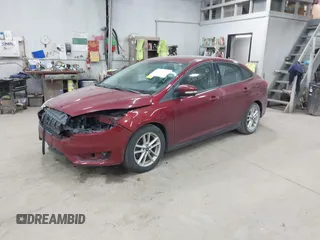 2015 Ford Focus SE with VIN 1FADP3F21FL270827, listed as a IAAI auction lot 42665015 with 162,745 mi miles and . Bid and sale history available at DreamBid. Image 2.