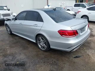 2014 Mercedes-Benz E with VIN WDDHF5KB8EB009303, listed as a IAAI auction lot 42014846 with 97,214 mi miles. Bid and sale history available at carsss.com. Image 3.