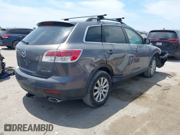 2008 Mazda CX-9 Grand Touring z VIN JM3TB38AX80141604, wystawiony jako IAAI lot #42069685 z przebiegiem 153 620 mil mil oraz . Historia ofert i sprzedaży dostępna na DreamBid. Obrazek 4.