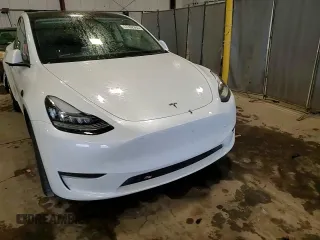 2022 Tesla Model Y Long Range z VIN 7SAYGDEEXNA012904, wystawiony jako Copart lot #57492865 z przebiegiem 31 294 mil mil oraz Szkody całkowita. Historia ofert i sprzedaży dostępna na DreamBid. Obrazek 14.