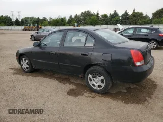 2003 Hyundai Elantra GLS z VIN KMHDN45D63U594320, wystawiony jako Copart lot #58742565 z przebiegiem 163 772 mil mil oraz Szkoda całkowita • Salvage title. Historia ofert i sprzedaży dostępna na DreamBid. Obrazek 2.