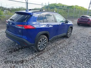 2024 Toyota Corolla Cross XLE with VIN 7MUDAABG8RV106100, listed as a IAAI auction lot 42220089 with 8,181 mi miles and . Bid and sale history available at DreamBid. Image 4.