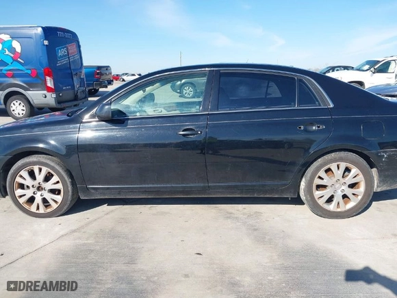 2009 Toyota Avalon XL with VIN 4T1BK36B89U335604, listed as a IAAI auction lot 41328877 with 166,396 mi miles. Bid and sale history available at carsss.com. Image 14.