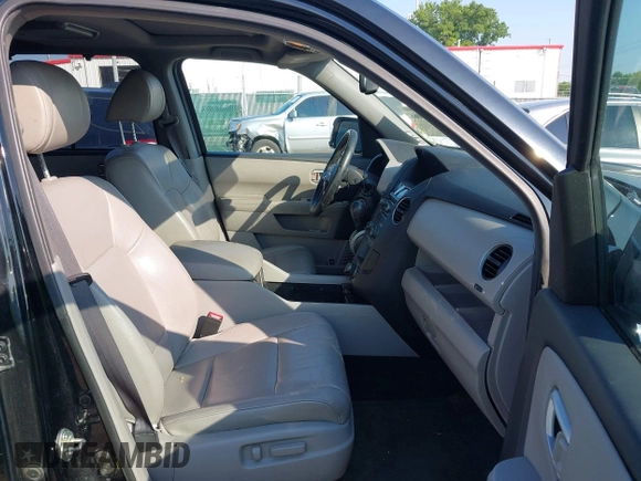 2013 Honda Pilot Touring z VIN 5FNYF4H96DB084148, wystawiony jako IAAI lot #42465066 z przebiegiem 220 339 mil mil oraz . Historia ofert i sprzedaży dostępna na DreamBid. Obrazek 5.