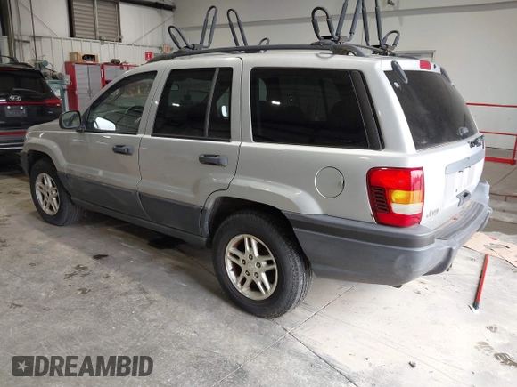 2004 Jeep Grand Cherokee Laredo with VIN 1J4GW48S44C161864, listed as a IAAI auction lot 42764536 with 143,833 mi miles and . Bid and sale history available at DreamBid. Image 3.