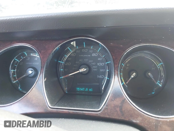 2010 Ford Taurus Limited with VIN 1FAHP2FW1AG101231, listed as a IAAI auction lot 41649972 with 75,147 mi miles. Bid and sale history available at carsss.com. Image 7.