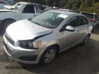 2014 Chevrolet Sonic LT z VIN 1G1JC5SH3E4178750, wystawiony jako IAAI lot #37660997 z przebiegiem 187 073 mil mil oraz . Historia ofert i sprzedaży dostępna na DreamBid. Obrazek 2.