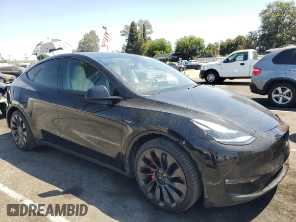 2022 Tesla Model Y Performance with VIN 7SAYGDEF4NF436834, listed as a Copart auction lot 68992234 with 22,171 mi miles and Salvage title. Bid and sale history available at DreamBid. Image 4.