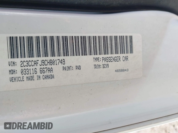2012 Chrysler 300 SRT-8 with VIN 2C3CCAFJ9CH801749, listed as a IAAI auction lot 40912606 with 144,404 mi miles and . Bid and sale history available at DreamBid. Image 9.