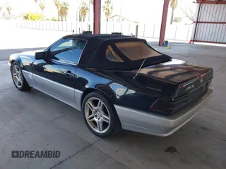 1990 Mercedes-Benz 500 z VIN WDBFA66E6LF010254, wystawiony jako IAAI lot #41942109 z przebiegiem 100 274 mil mil oraz . Historia ofert i sprzedaży dostępna na DreamBid. Obrazek 3.