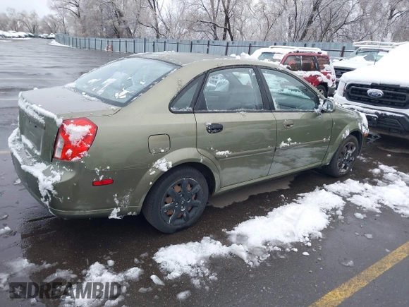 2004 Suzuki Forenza S z VIN KL5JD52Z64K027219, wystawiony jako IAAI lot #41799510 z przebiegiem Nie podano mil oraz . Historia ofert i sprzedaży dostępna na DreamBid. Obrazek 4.