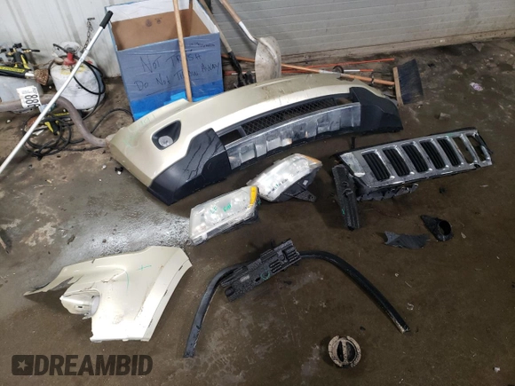 2011 Jeep Grand Cherokee Laredo with VIN 1J4RR4GG4BC585586, listed as a Copart auction lot 46373955 with 163,247 mi miles and Salvage Title. Bid and sale history available at carsss.com. Image 12.